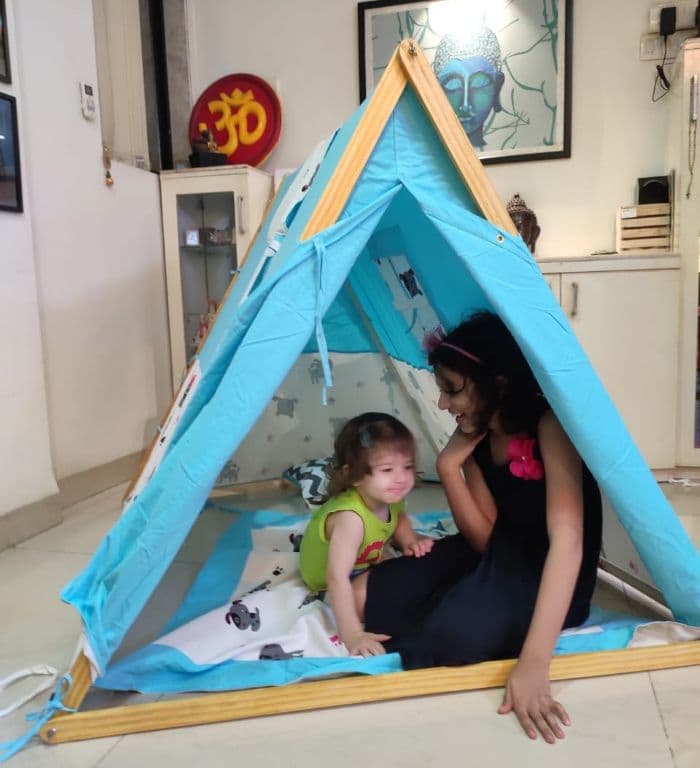 kids playing in a blue A-Shape kids tent